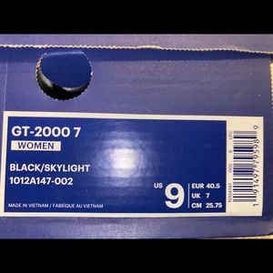 ASICS running sneakers run a half size small.